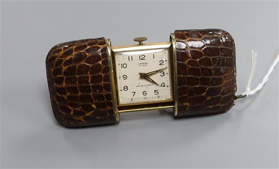 A leather mounted gilt metal cased Lancel, Paris travelling watch, 54mm.